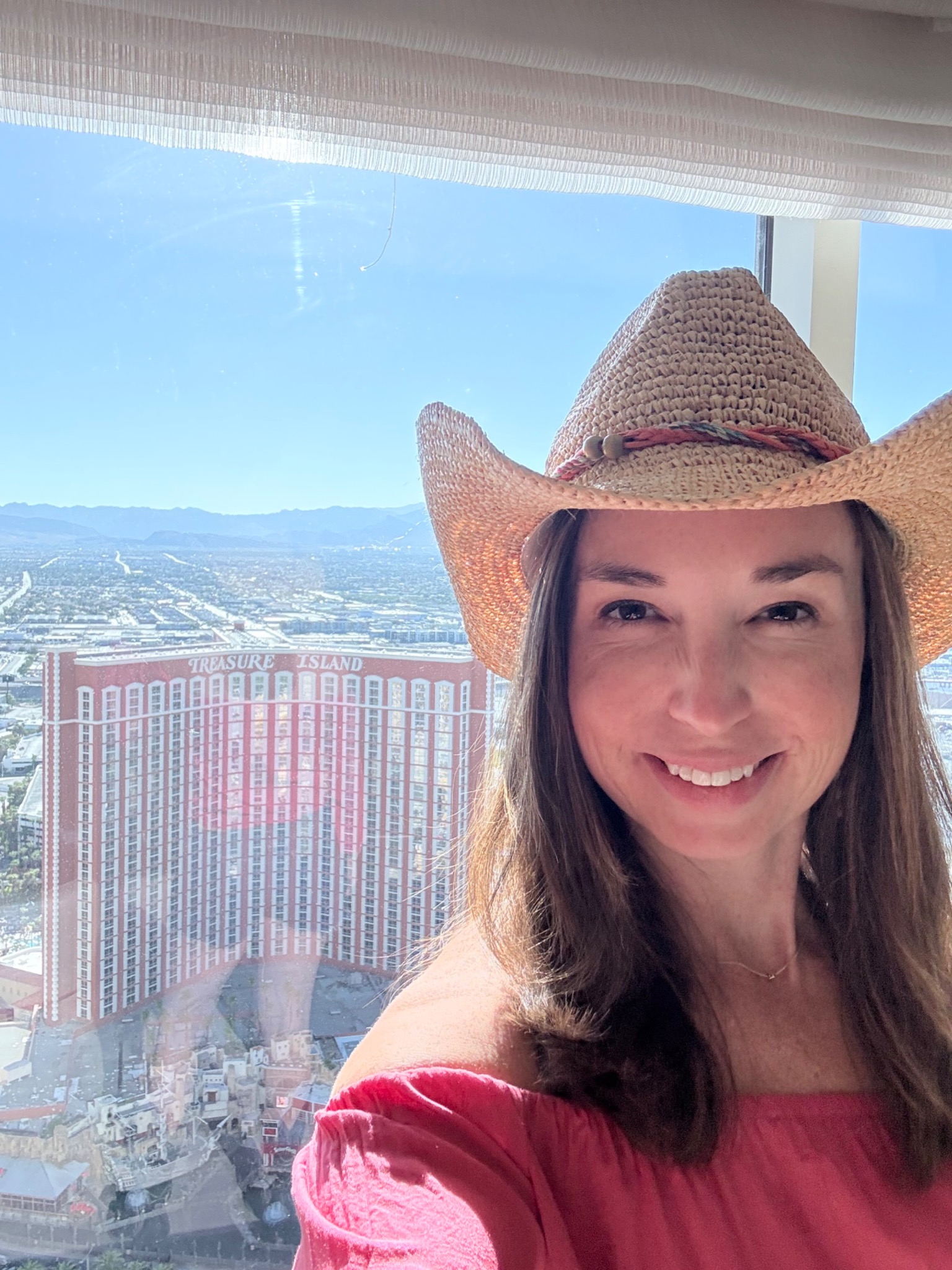 Katie at the Palazzo in Las Vegas with a view of Treasure Island
