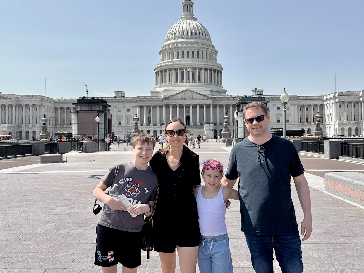 Family visiting the United States Capitol during a Washington DC spring break trip booked using points and miles