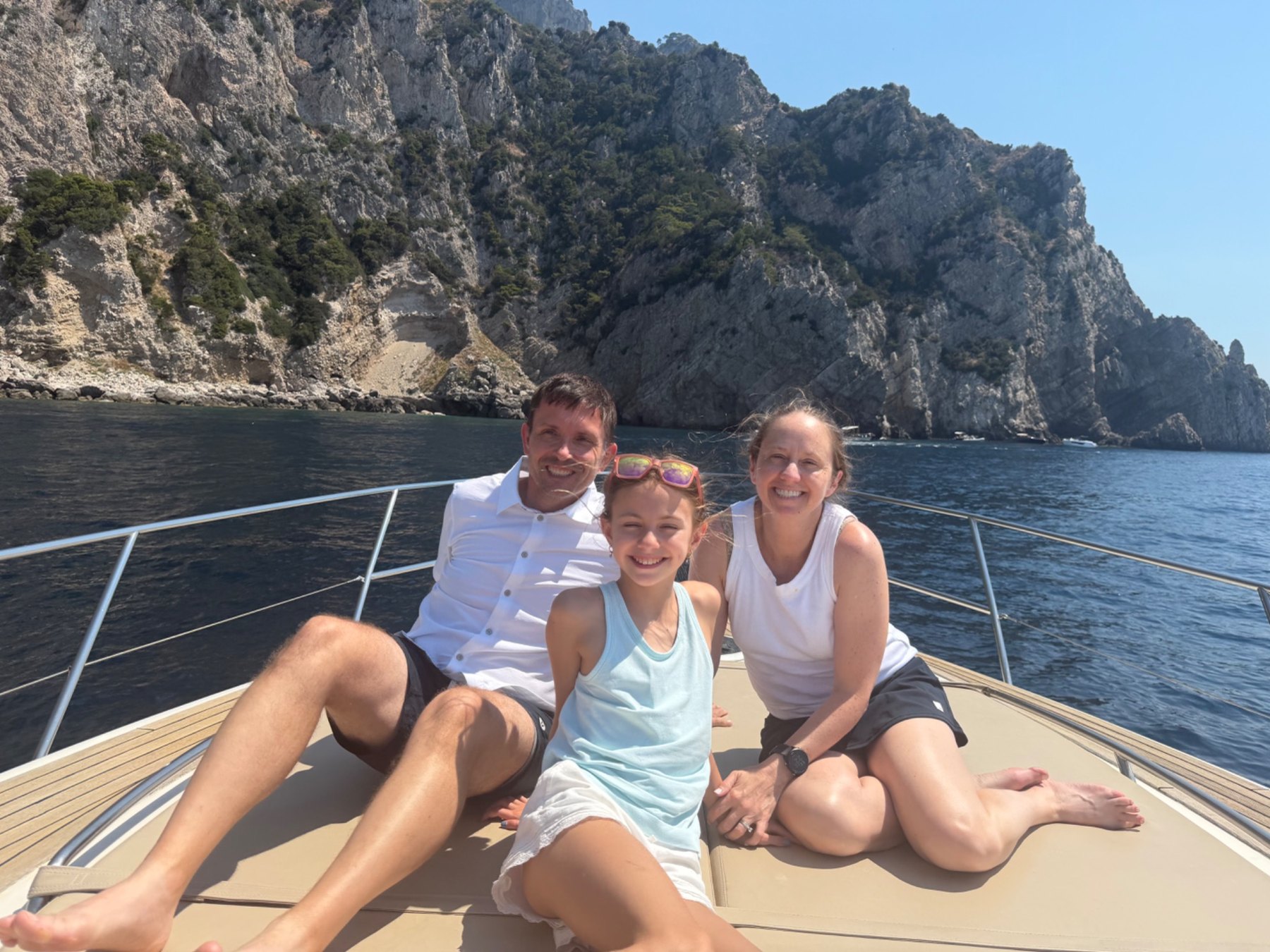 Kim enjoying the private boat day with her family in Italy